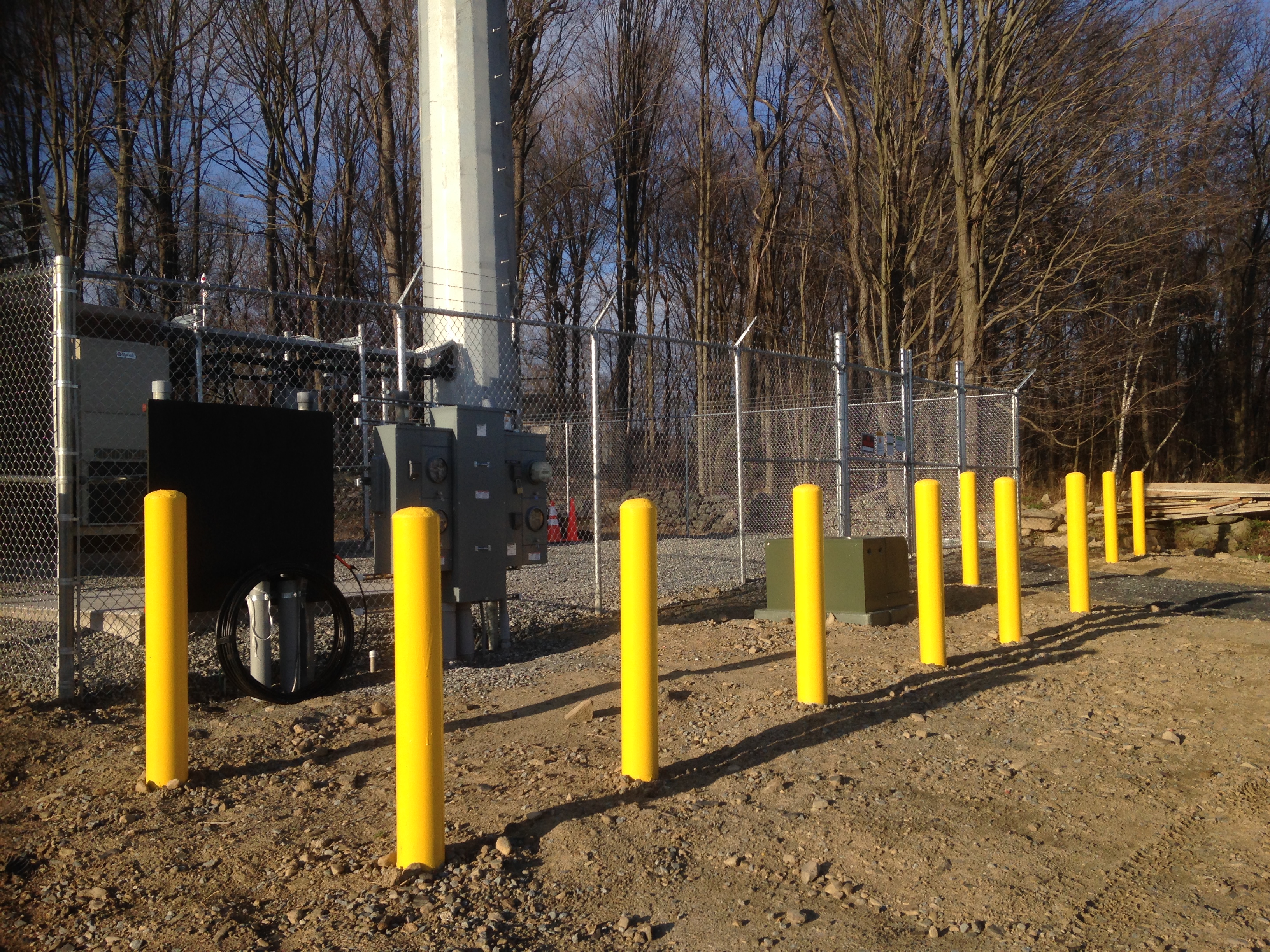 8 Chainlink fence with barbed wire around a cell tower
