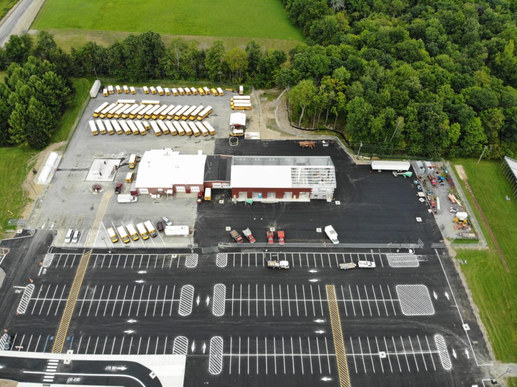 An aerial photo of the new paltz school district bus garage, depicting the preimeter fence. 