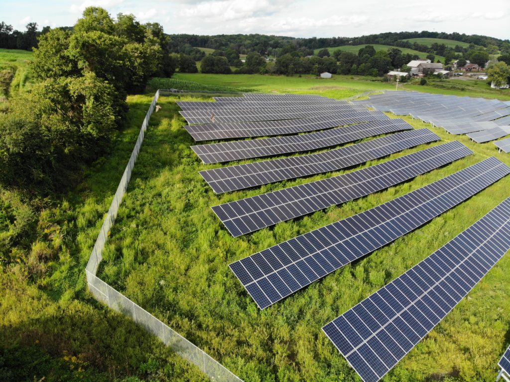 Solar panels with security fence surrounding them