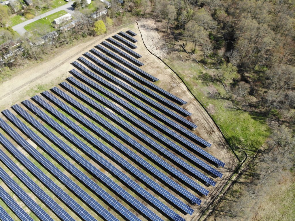 Solar Farm with Black Chainlink Fence