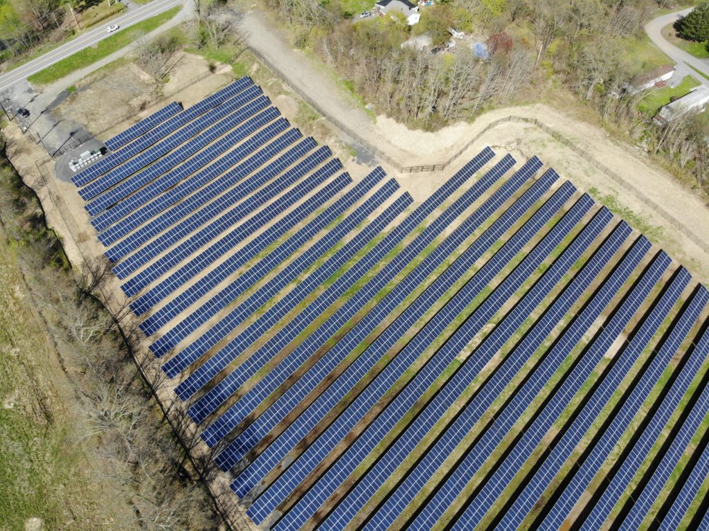 Solar Farm with Black Chainlink Fence