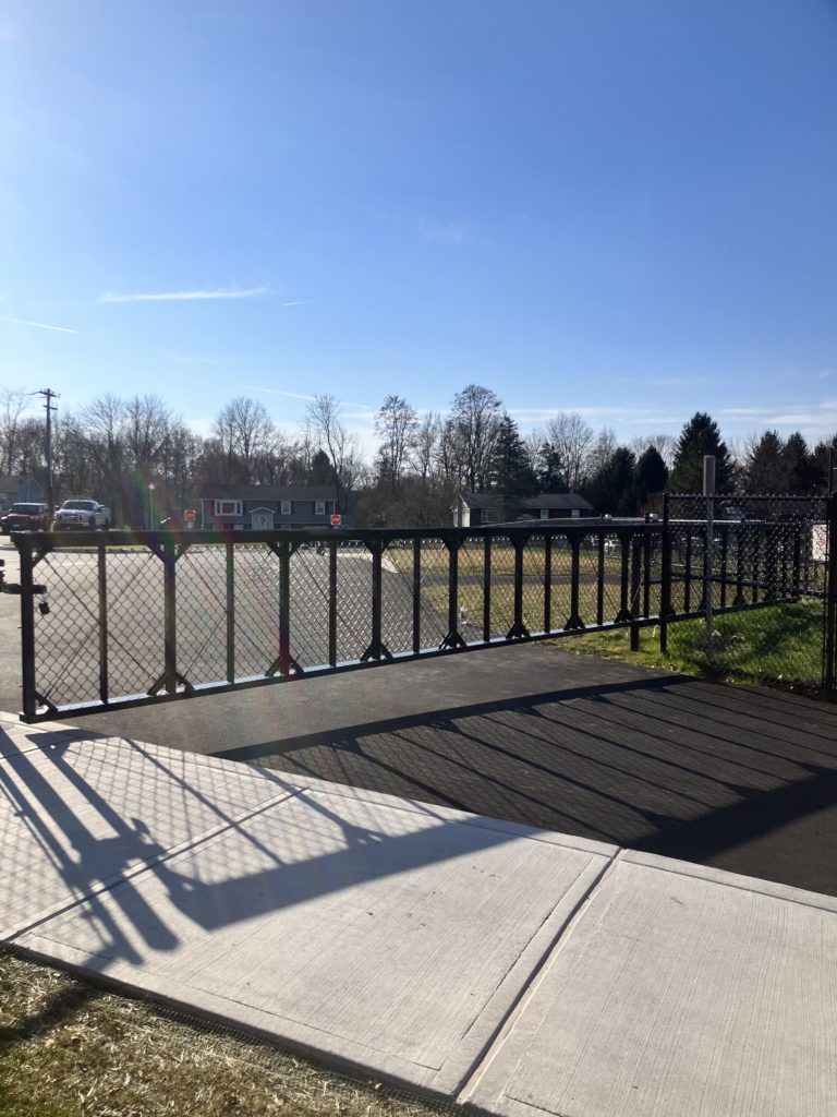 Sliding chainlink gate