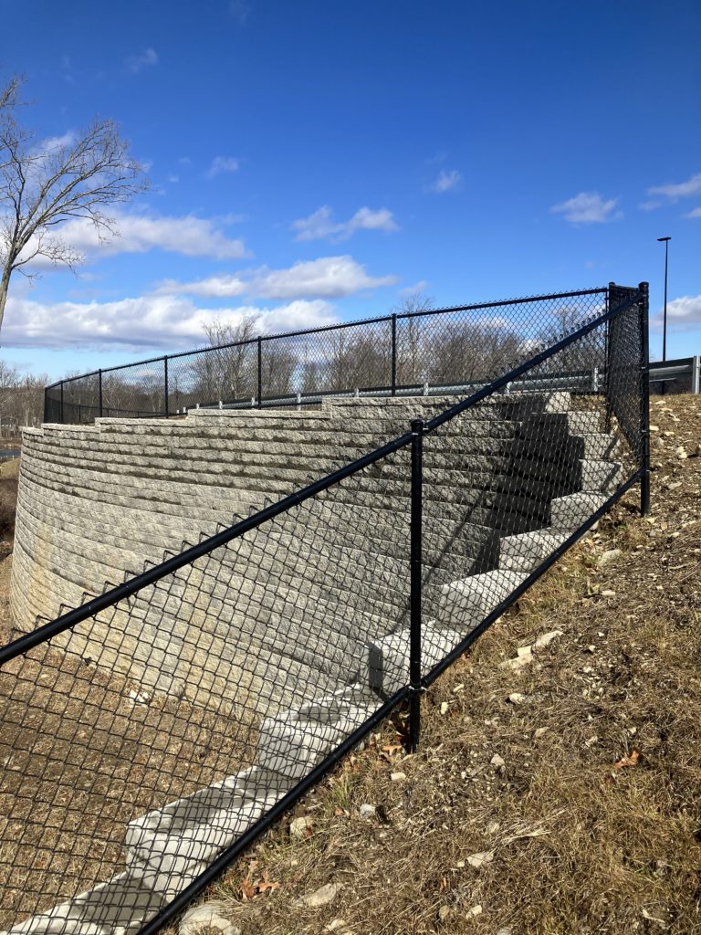 Retaining Wall with Chainlink Fence