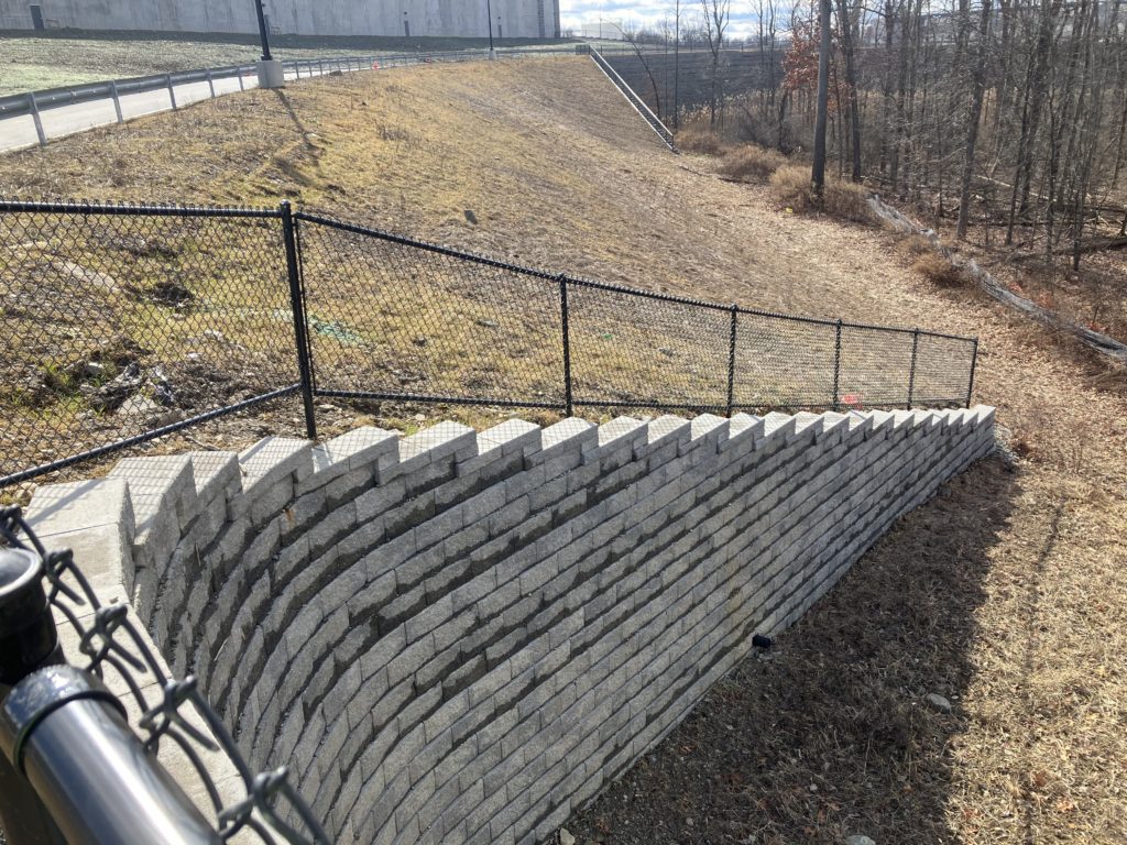 Retaining Wall with Chainlink Fence